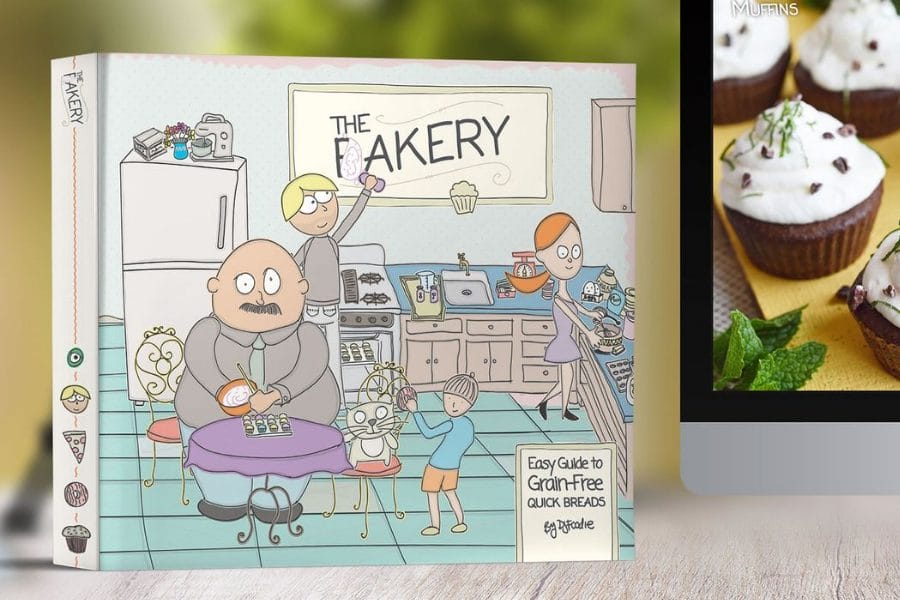 Paperback copy of The Fakery cookbook next to a digital tablet, both showing the cover featuring cartoon characters baking grain-free quickbreads in a colorful kitchen.